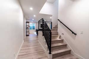 Staircase with wood-type flooring