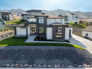 View of front of home with mountain and valley views!