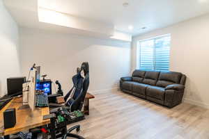 Office space featuring light hardwood / wood-style floors