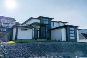 View of front facade with a balcony