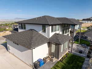 Exterior space featuring a mountain view and a patio area