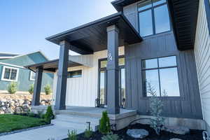 Doorway to property with a porch