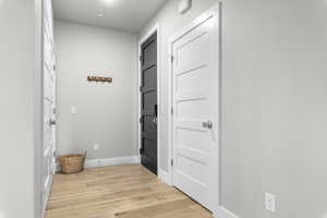 Doorway to outside featuring light hardwood / wood-style floors