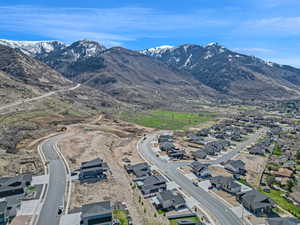 Property view of mountains with a residential view
