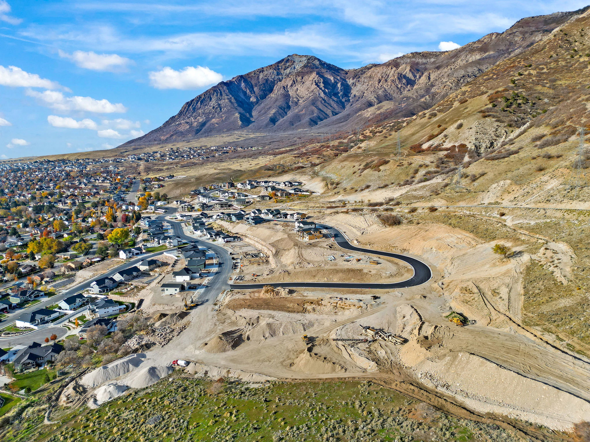 View of mountain backdrop with nearby suburban area