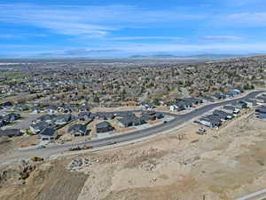 Aerial view featuring a mountain view and a residential view
