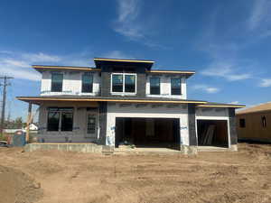 Property under construction featuring covered porch