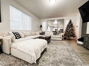 Large great room with plenty of room for a Christmas tree, prewired for 2 speakers with independent volume control zone and access from the garage.