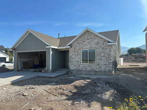 View of front of property with a mountain view