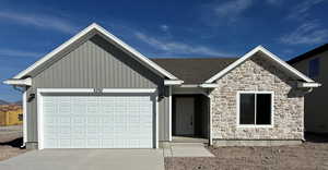 View of front of property with a garage