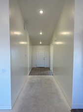 Hallway with concrete flooring