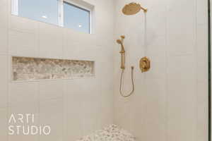 Bathroom with tiled shower