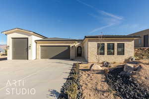 View of front of home with a garage