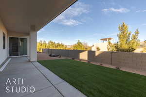 View of yard with a patio