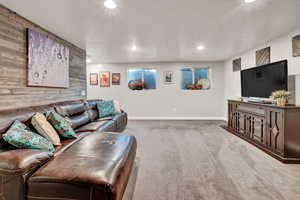 Living room featuring carpet flooring