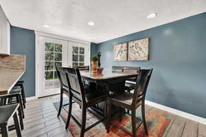 Dining area featuring tile flooring.