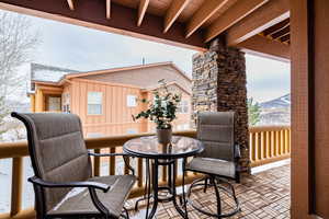 Balcony featuring a patio area and a mountain view