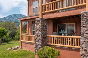 Property entrance featuring a balcony and a mountain view