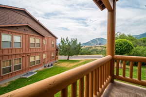 Balcony with cooling unit and a mountain view