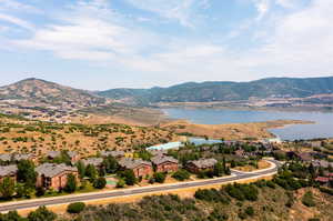 Bird's eye view with a water and mountain view