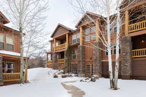 View of snow covered property