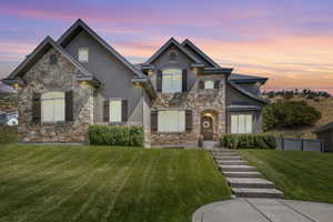 View of front of house featuring a yard