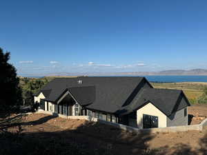 View of front of home with a mountain view