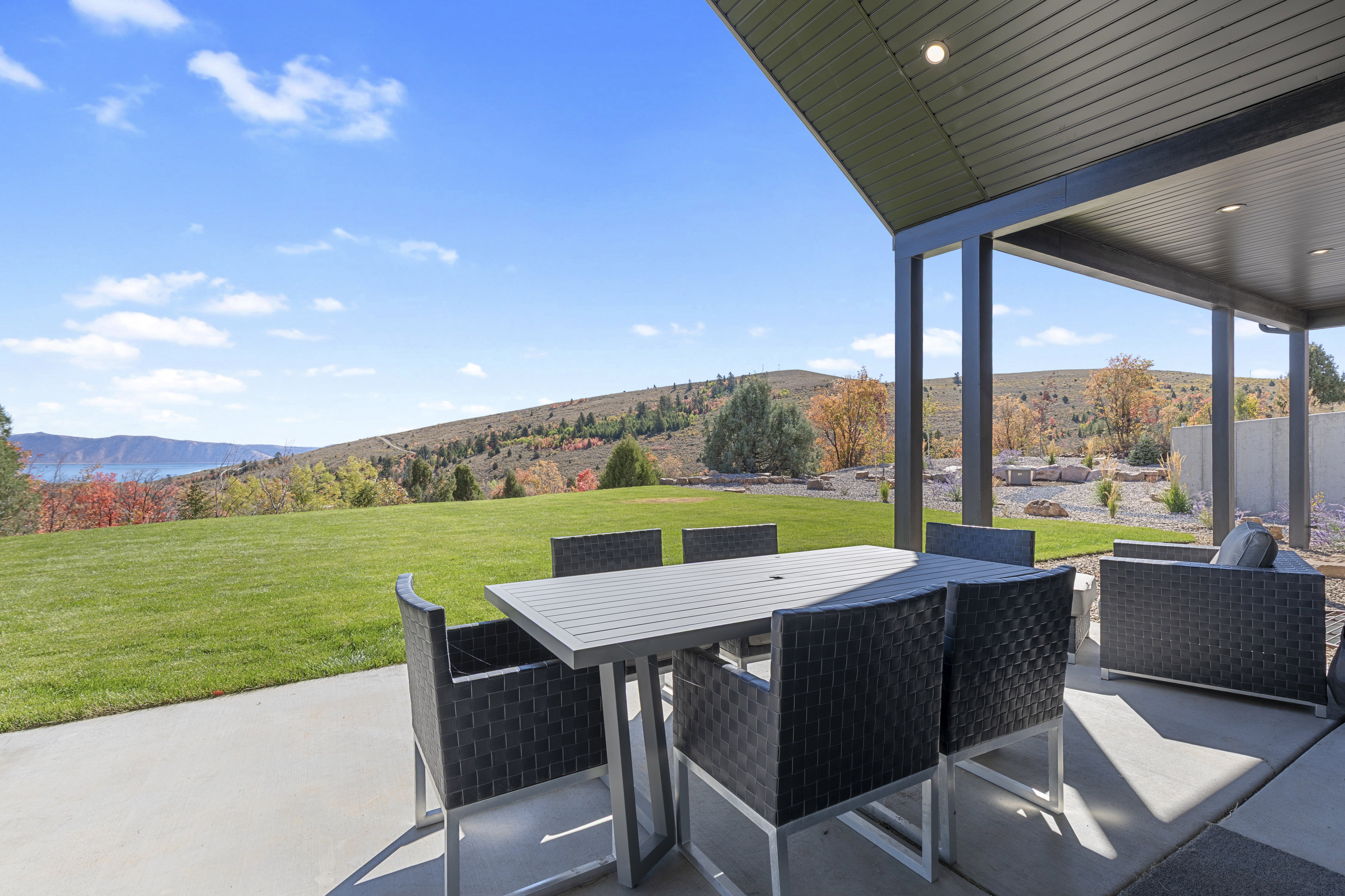 View of patio / terrace with outdoor dining area and a mountain view