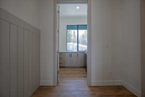 Hall with light wood-type flooring