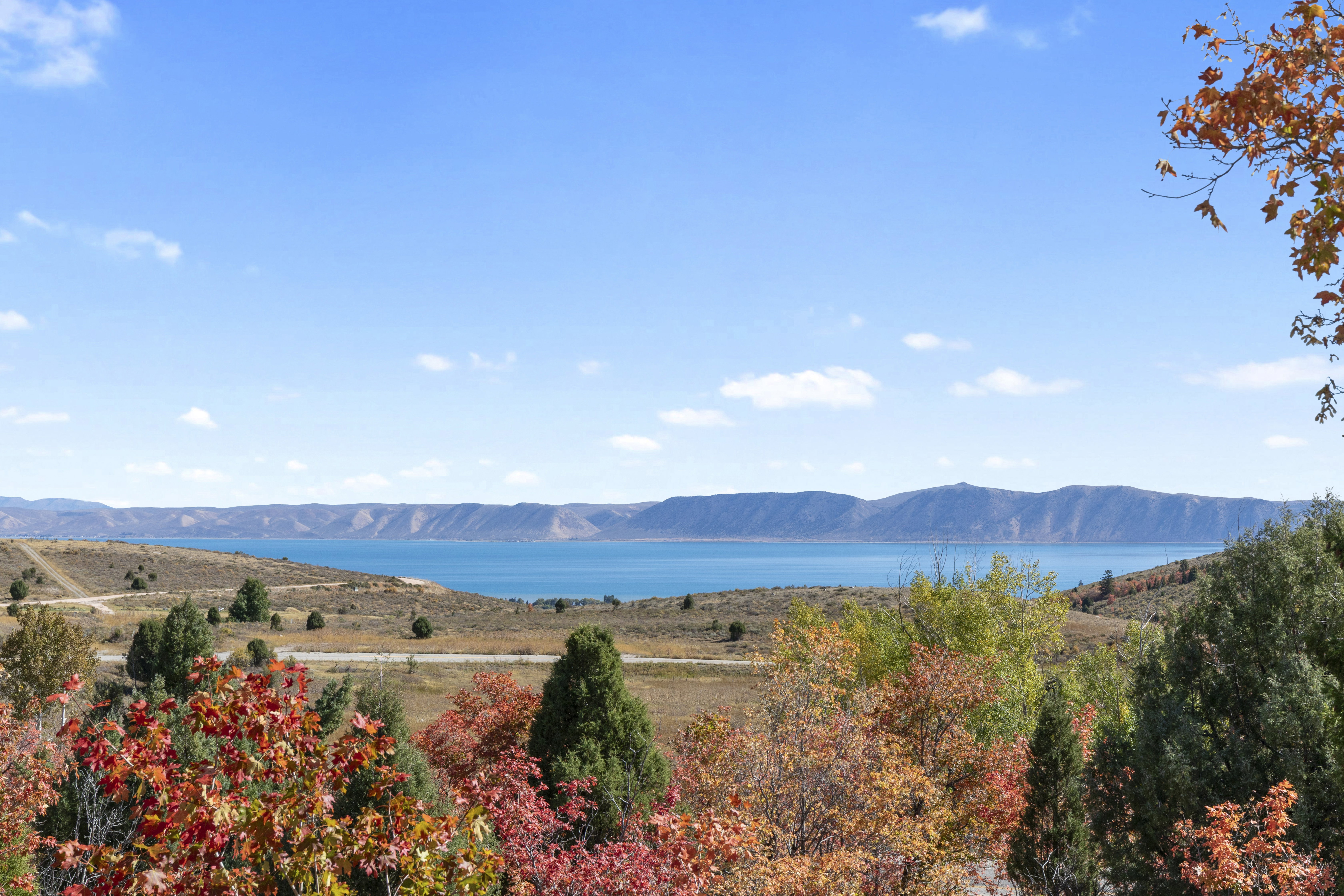 View of mountain backdrop with a large body of water
