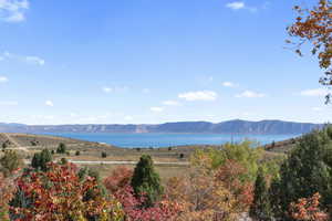 View of mountain backdrop with a large body of water