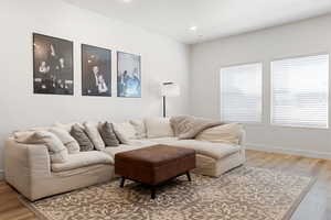 Living room featuring hardwood / wood-style flooring