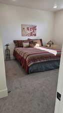 Bedroom featuring carpet floors