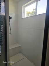 Bathroom featuring walk in shower