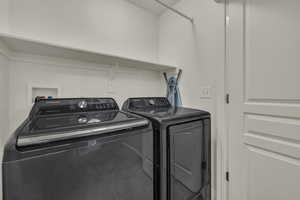 Laundry area with separate washer and dryer