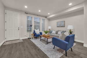 Living room featuring dark hardwood / wood-style floors