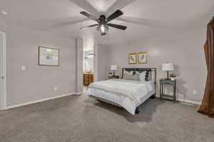 Bedroom with ensuite bathroom and ceiling fan