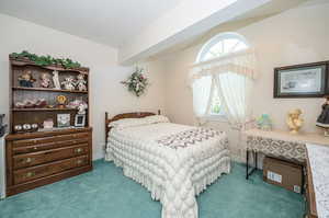 Bedroom featuring carpet flooring