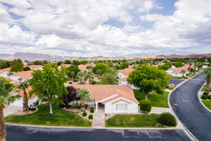 Birds eye view of property featuring a mountain view