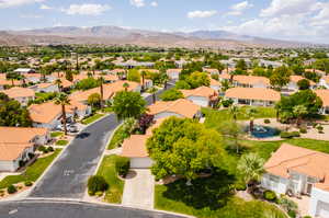 Birds eye view of property featuring a mountain view