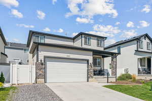 View of front of house with a garage