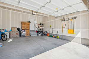 Garage featuring a garage door opener