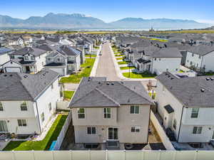 Birds eye view of property with a mountain view