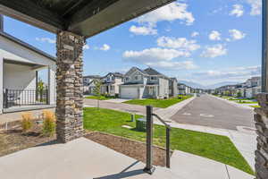 View of patio featuring a garage