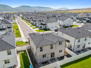 Birds eye view of property with a mountain view