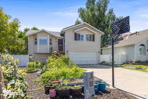 View of front of property with a garage