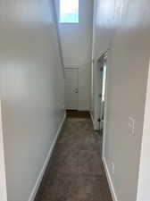 Corridor with carpet flooring