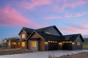 Modern inspired farmhouse with a garage