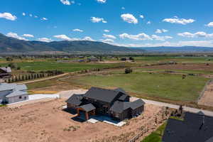 Bird's eye view featuring a mountain view and a rural view