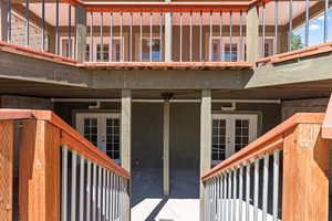 Entrance to covered patio off walkout basement